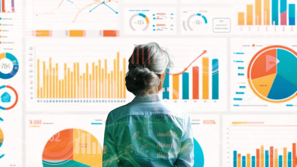 people analytics: responsabile HR, di spalle, che analizza grafici e statistiche sul personale